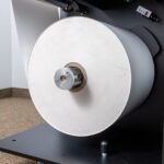 Large input roll either pre printed or blank labels
