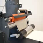 Label paper path input side for LT5C inline label rewinder and slitter for narrow label rolls