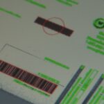 Inspection of printed label with defects and correct elements highlighted