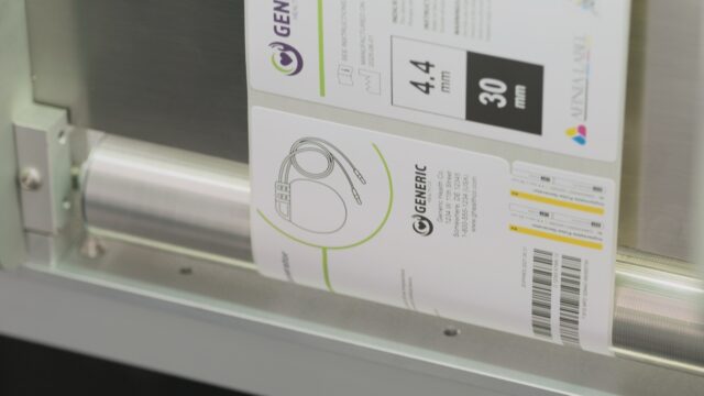 Closeup of X350 printed label as it is inspected by the Inspectra In-Line Vision Inspection System